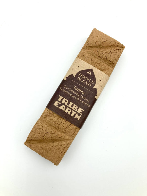 Packaged handmade incense planks with branding visible on the label.