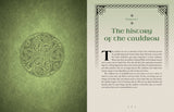 Book with green cover featuring a Celtic knot design and text on history of the cauldron.