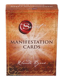 Box of 'The Secret' Manifestation Cards by Rhonda Byrne with a warm color scheme.