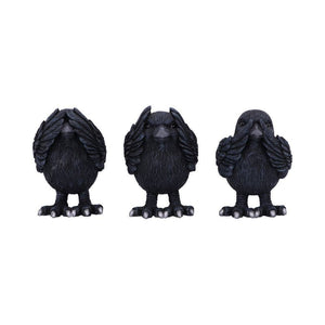 Three black bird figurines on a white background