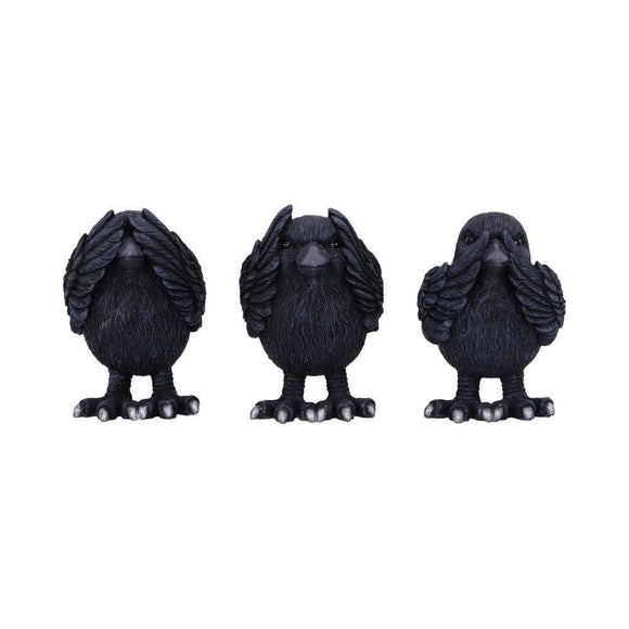 Three black bird figurines on a white background