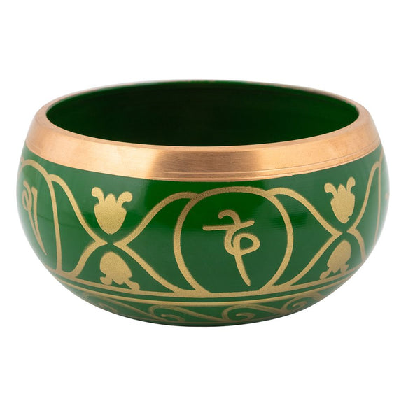 Green bowl with gold patterns and symbols on a white background
