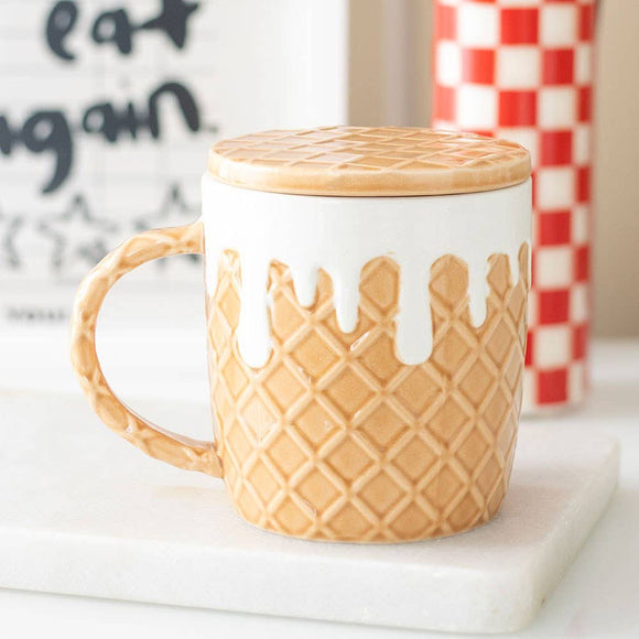 Mug with waffle design and wooden lid on a white surface