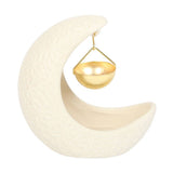 Decorative moon-shaped holder with a gold bowl on a white background