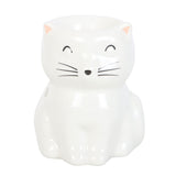 White cat-shaped night light on a white background