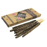 Incense sticks with a decorative box on a white background