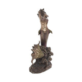 Bronze mermaid figurine with a shell on a white background