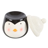 Ceramic penguin with a white hat on a white background