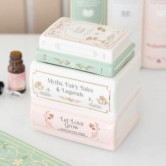 Decorative boxes with 'Myths, Fairy Tales & Legends' and 'Let Love Grow' text on a light surface.