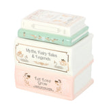 Decorative book-shaped container with 'Myths, Fairy Tales & Legends' and 'Let Love Grow' text on a white background.